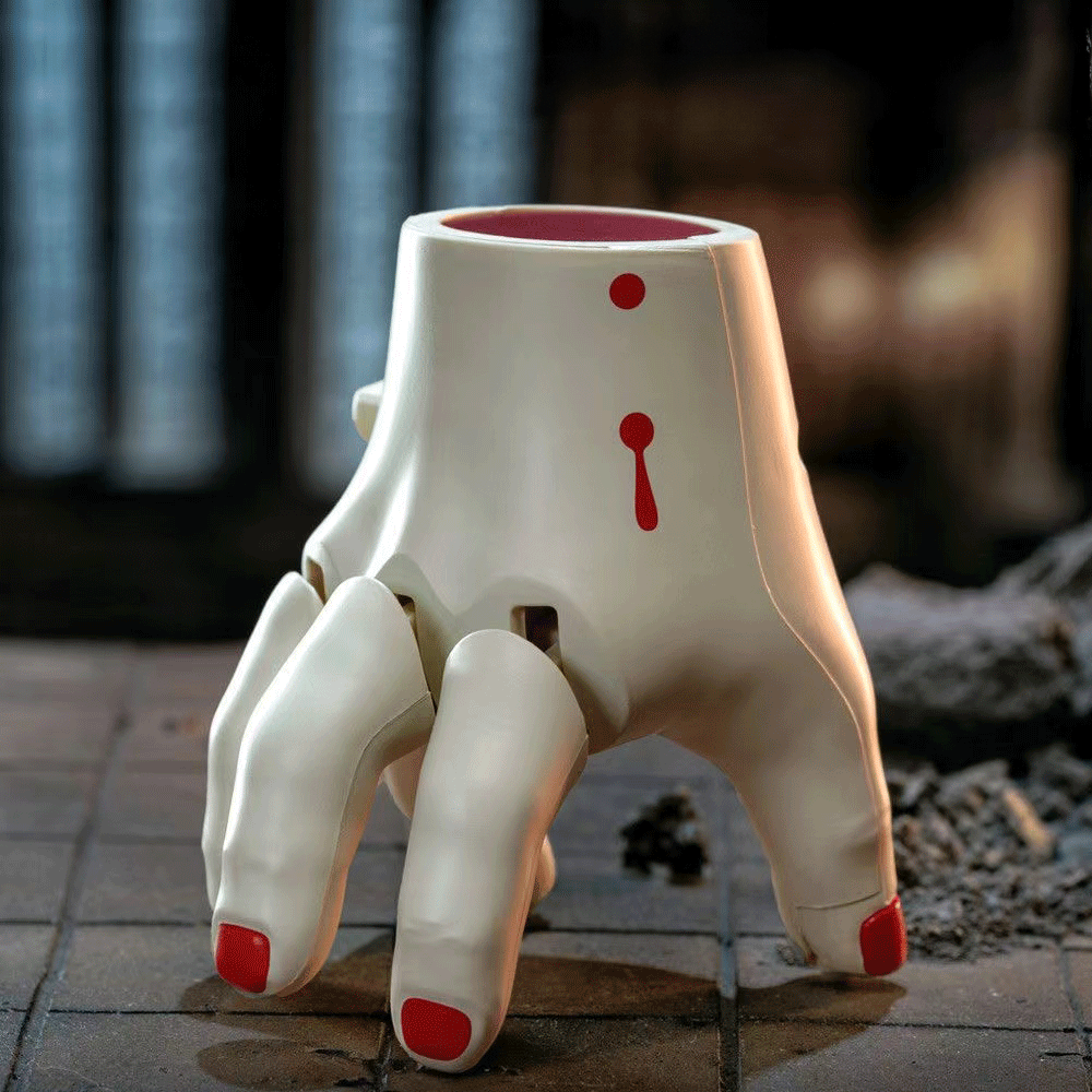 Terrifying Halloween Monster Hand, a wind-up hand that walks automatically